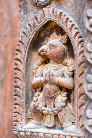 Bhaktapur, Nepal - July 16, 2018 : Traditional wooden sculpture in Bhatktapur city, famous for the best-preserved palace courtyards and old city center in Nepal, is also a UNESCO World Heritage Siteのeditorial素材