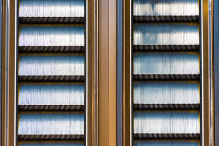 Symmetrical rolling stairs, empty escalator