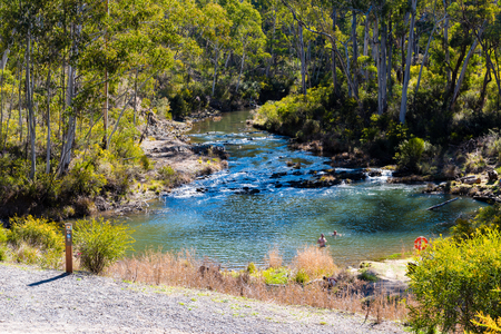 Kosciuszko National Park, NSW, Australia - September 30, 2018 : River at Yarrangobilly Caves' thermal pool is fed by a natural spring in Yarrangobilly area, Kosciuszko National Park, NSW, Australiaのeditorial素材