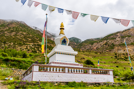 Manang village, Annapurna Conservation Area, Nepal - July 26, 2018 : Prayer wheels in Tibetan Buddhist tradition are used to accumulate wisdom and merit and to purify negativitiesのeditorial素材