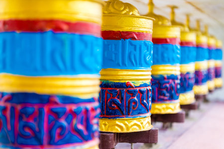 Manang village, Annapurna Conservation Area, Nepal - July 26, 2018 : Prayer wheels in Tibetan Buddhist tradition are used to accumulate wisdom and merit and to purify negativitiesのeditorial素材