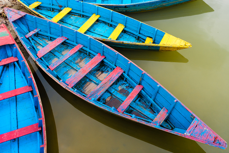 Detail of colourful boat on Phewa lake in Pokhara, the most popular and visited lake of Nepal.の写真素材