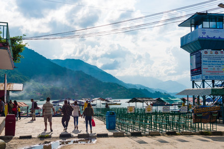 Pokhara, Nepal - July 31, 2018 : Colourful boats on Phewa lake in Pokhara, the most popular and...