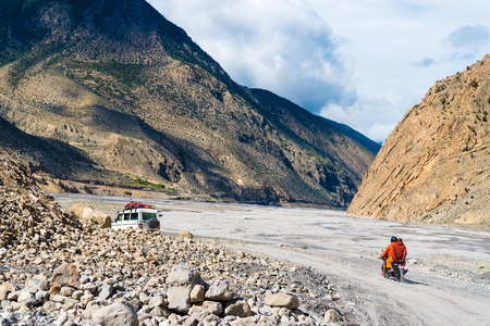 Jomsom, Mustang, Nepal - July 29, 2018 : Off road vehicles with tourists in Annapurna Conservation Area, a hotspot destination for mountaineers and Nepal's largest protected area.のeditorial素材