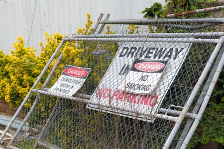 Kangaroo Valley, NSW, Australia-June 8, 2019: Construction and work in progress signs on wire fence gatesのeditorial素材