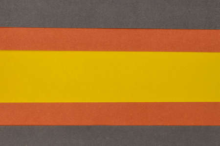Orange, Grey and Yellow coloured paper background, abstract contrast conceptual imageの写真素材