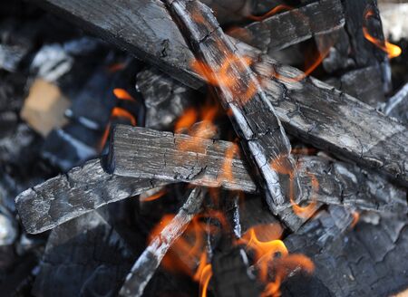 hot coals in the fireの写真素材