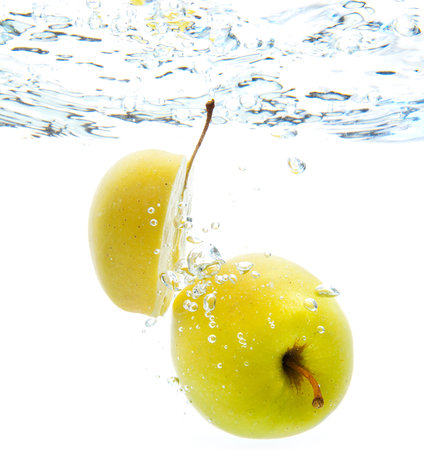 apple in waterの写真素材