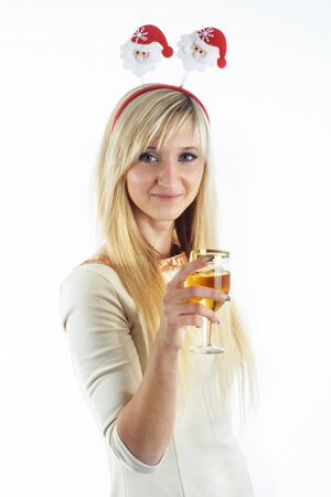 blonde woman holding glass of wineの写真素材