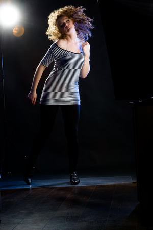 young woman dancingの写真素材