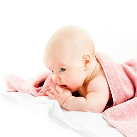 baby girl im towelの写真素材