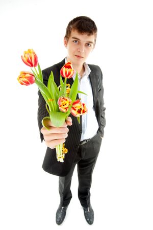 Businessman offering tulipの写真素材