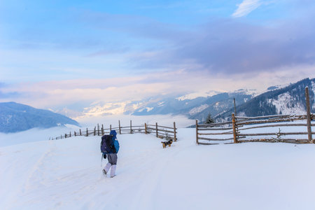 tourist in winter in the mountains