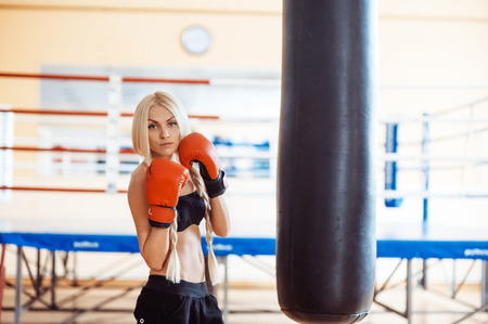 Pretty sport woman with boxing glovesの写真素材