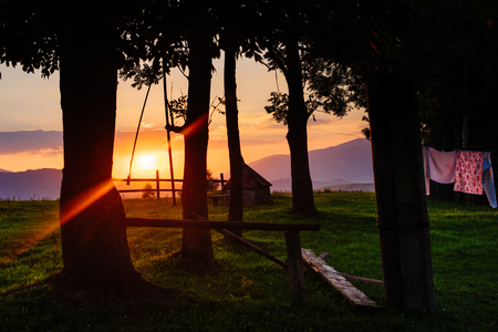 village silhouette at sunsetの写真素材