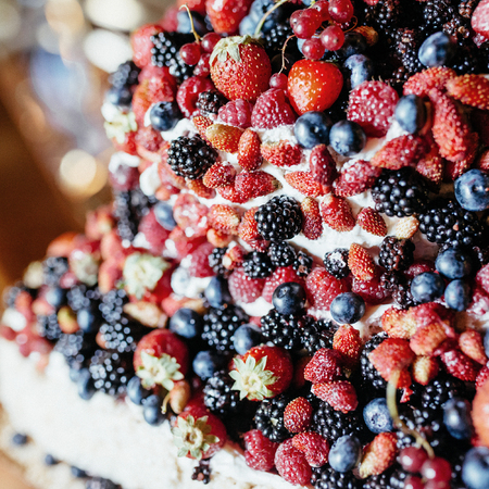 Fruits and flowers on banquet tableの写真素材