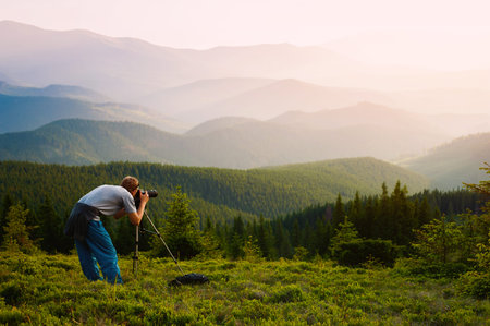Professional photographer through the mountains.