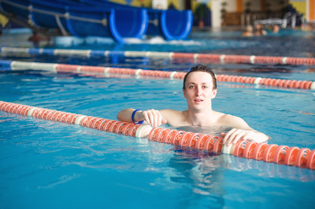 guy in poolの写真素材