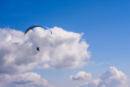 Skydiver in the clear sky