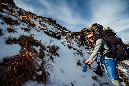 Professional photographer journey through the mountains.の写真素材