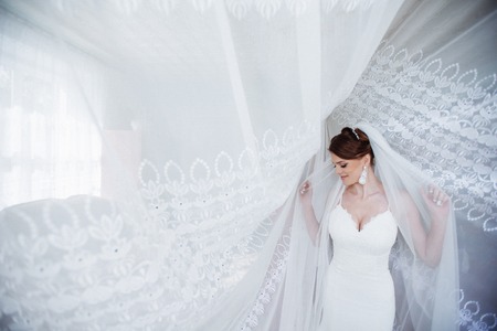 Beautiful bride posing in daylightの写真素材