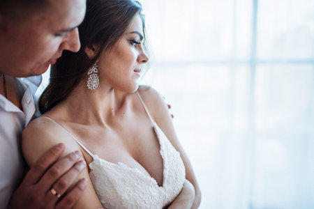 Wedding couple in hotel room