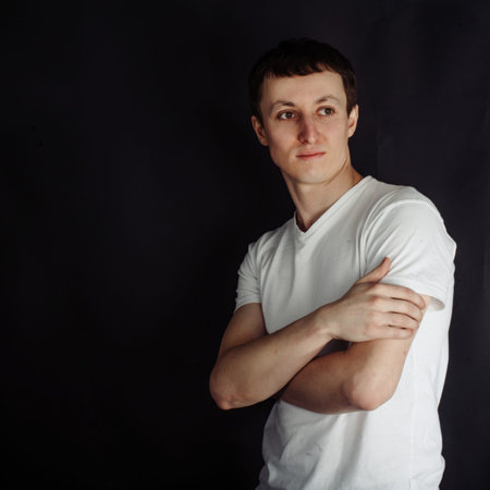 Beautiful young man in white shirtの写真素材