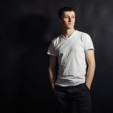 Beautiful young man in white shirt