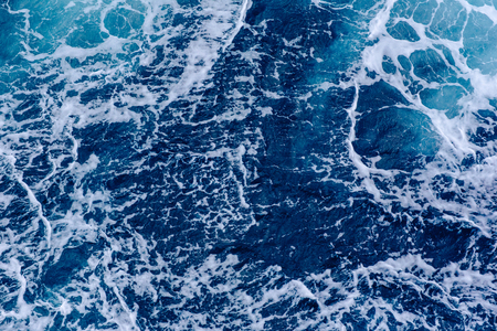 Background blue waves of the seaの写真素材