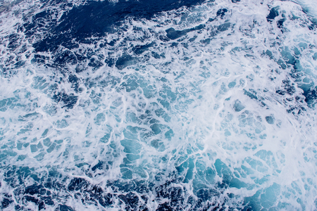 Background blue waves of the seaの写真素材