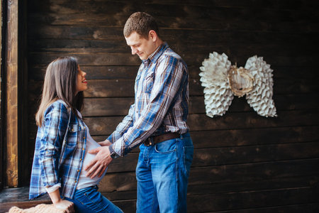 pregnant woman with her husband waiting for  newborn
