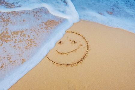 Smiley in the sand.の写真素材