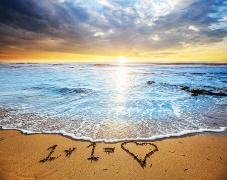 Sunset on the sandy beach.の写真素材