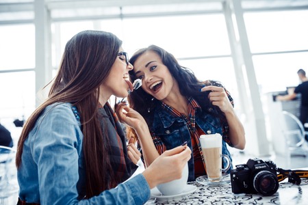 Girl drink coffee latte.Art processing and retouching photos speの写真素材