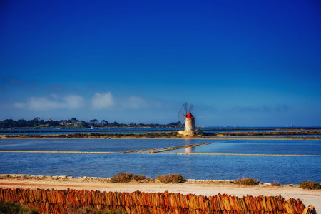 Windmill on the sea. Beauty world.