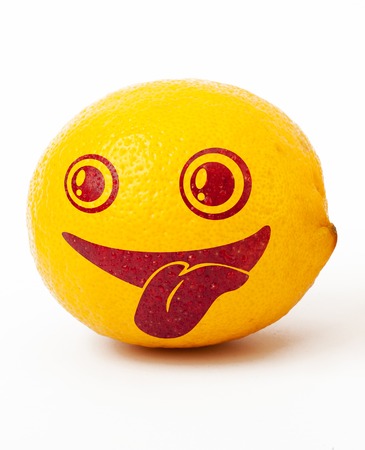 Smiley lemon isolated on a white backgroundの写真素材