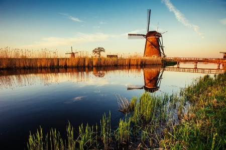 Traditional Dutch windmills from the channel Rotterdam. Holland.の写真素材