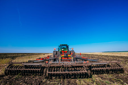 Working Harvesting Combine in the Field of Wheat