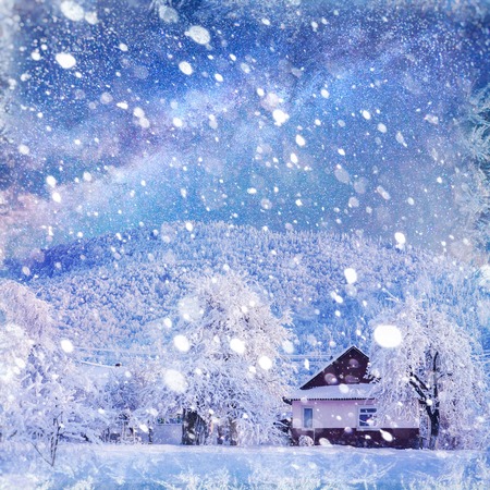 fantastic winter landscape. Chalet under the stars.の写真素材