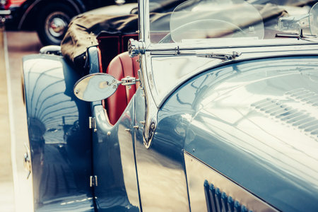 part retro car close-up. Beautiful style transport exhibition