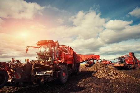 tractors working in the field. Carpathians. Ukraine Europeの写真素材