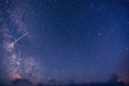 fantastic winter meteor shower and the snow-capped mountains