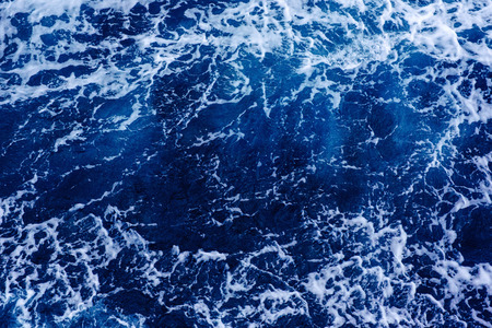 Background blue waves of the sea. Beauty world.の写真素材