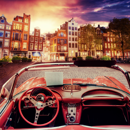 Beautiful vintage car on the street in Amsterdam, Netherlandsの写真素材
