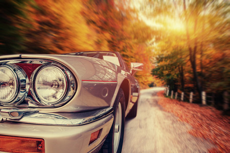 Fantastic asphalt road in the mountains. Classic carの写真素材