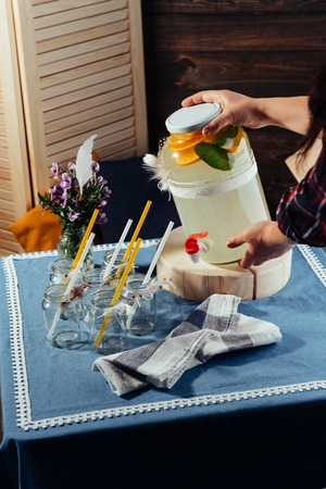 party drink station with small bottles and homemade lemonadeの写真素材