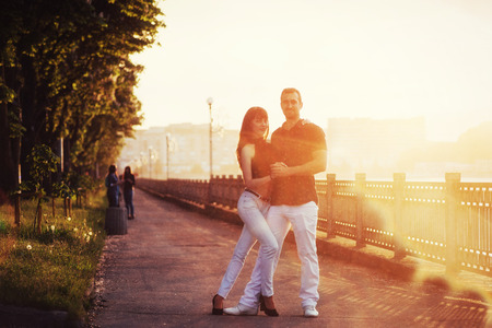 young couple dancing tango on the quayの写真素材