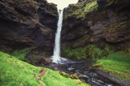 Fantastic landscape of mountains and waterfalls in Iceland.の写真素材