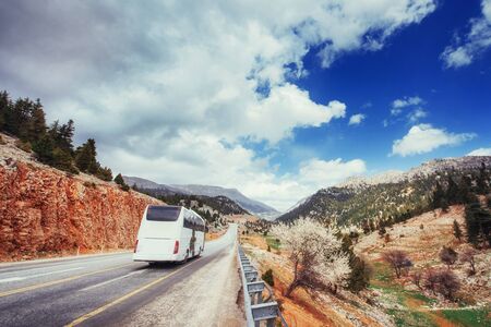 beautiful scenic highway in mountains. Car rides on asphalt surfの写真素材