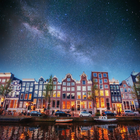 Fantastic starry sky at night in Amsterdam. Beautiful illuminatiの写真素材